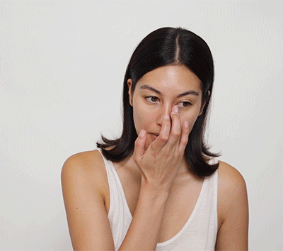 Model applies Aleph makeup