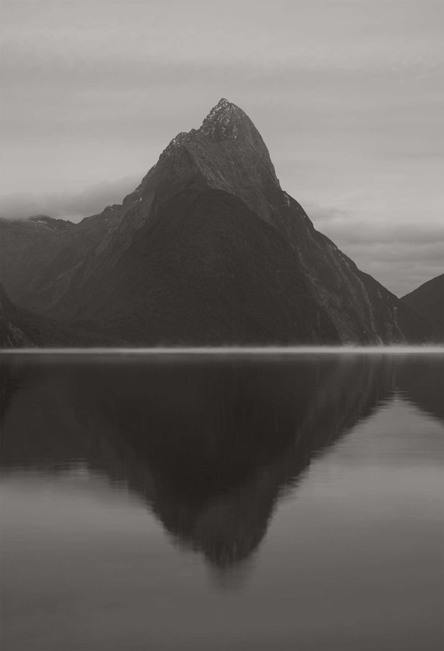 Image of mountain and lake in black and white