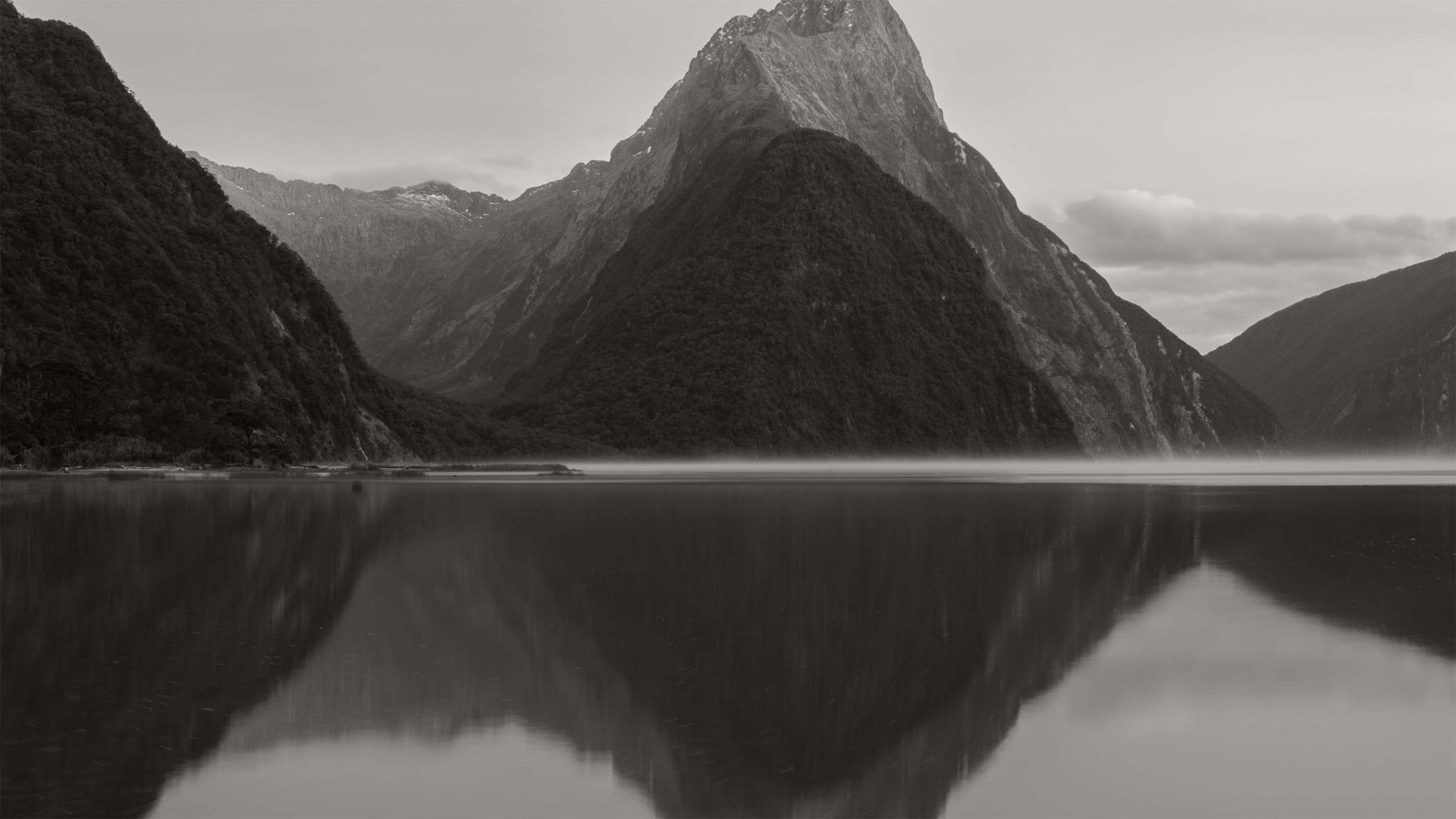 Image of mountain and lake in black and white