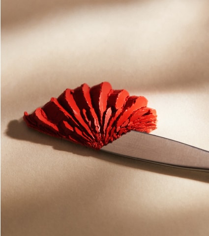 Close-up of Aleph Beauty Cheek/Lip Tint formulation on the mixing tool